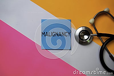 Malignancy text on sticky notes with color office desk. Healthcare/Medical concept Stock Photo