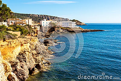 Mallorca island, beach in Sant Elm. Seashore, azure sea and buildings Stock Photo