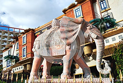 Statue of elephant against exterior of house turned upside down in Katmandu Park Editorial Stock Photo