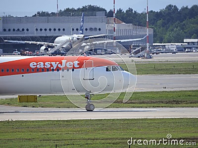 Malpensa airpot with airplane Editorial Stock Photo