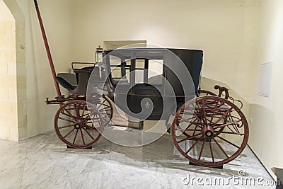 Bishops carriage in St Paul`s Cathedral museum Mdina Malta Editorial Stock Photo