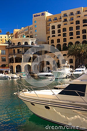 Malta marina St Julians with Hilton Hotel Editorial Stock Photo