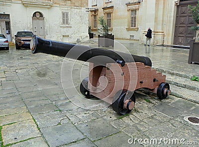 Malta, Mdina, fortifications of Mdina, St. Paul's Cathedral, gun near the temple Editorial Stock Photo