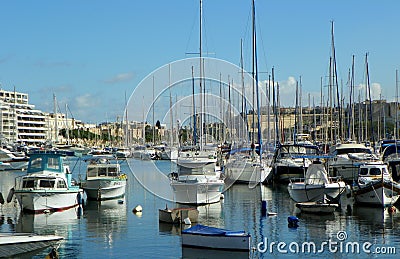 Malta, Msida, Msida Yacht Marina, yachts and boats in the waters of the Marsamxett Harbour Editorial Stock Photo