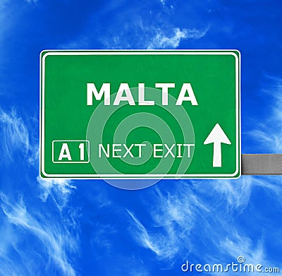 MALTA road sign against clear blue sky Stock Photo