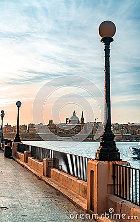 Malta`s Valletta harbor at sunrise Editorial Stock Photo