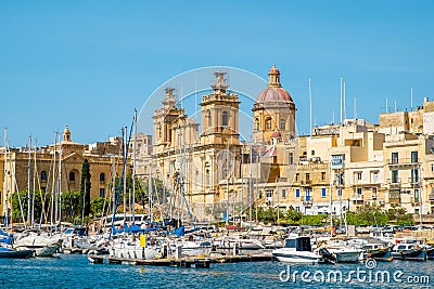 Maltese attractions. Birgu bay. Saint Lawrence Church Church Stock Photo