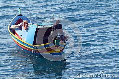 Maltese fishing boat, casting nets Editorial Stock Photo