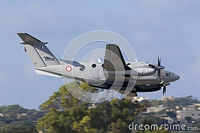 Maltese King Air on a low pass Editorial Stock Photo