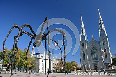 Maman by Louise Bourgeois and the Notre Dame Cathe Editorial Stock Photo