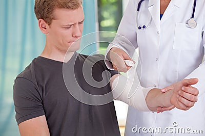 Man with aching hand Stock Photo