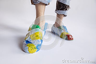 Man addicted of sales and clothes, wearing plastic, recycling concept Stock Photo