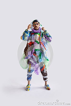 Man addicted of sales and clothes, wearing plastic, recycling concept Stock Photo