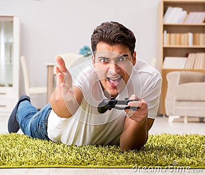 Man addicted to computer games Stock Photo