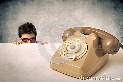 Man is afraid of the phone Stock Photo