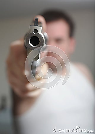 Man Aiming Gun Stock Photo