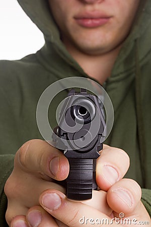 Man aiming a gun Stock Photo