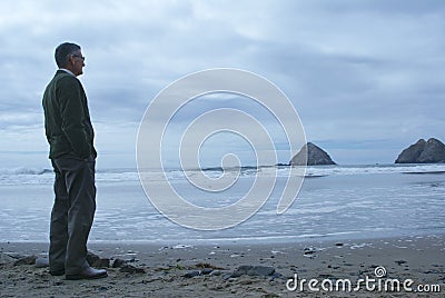 Man Alone Meditating or Thinking Stock Photo