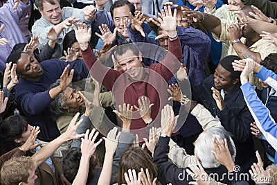 Man Amidst Around People Stock Photo