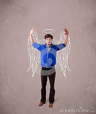 man with angel illustrated wings on grungy background Stock Photo