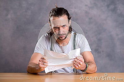 Man is annoyed about a letter Stock Photo