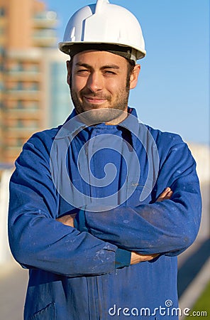 Man, architect and portrait smile in construction with arms crossed and hard hat in the city. Male person, engineer or Stock Photo