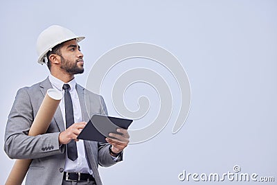 Man, architect and thinking with tablet on mockup in construction planning on a studio background. Person, engineer or Stock Photo