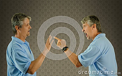 Man arguing w himself guilt and mental illness Stock Photo