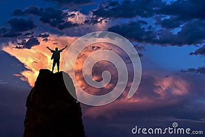 Man with arms raised in the sky winner success concept Stock Photo