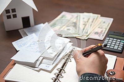 A man arranging receipts. Stock Photo