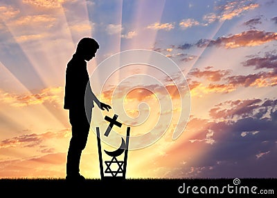 Man atheist throws all religions in the trash Stock Photo