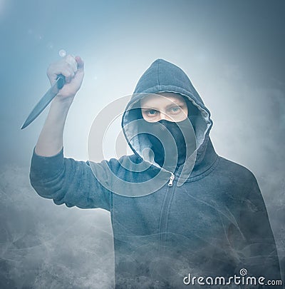 Man attack with knife Stock Photo