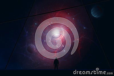 A man, back to camera, looking out of a spaceship window. With lights coming out of a portal, onto a universe of stars and planets Stock Photo