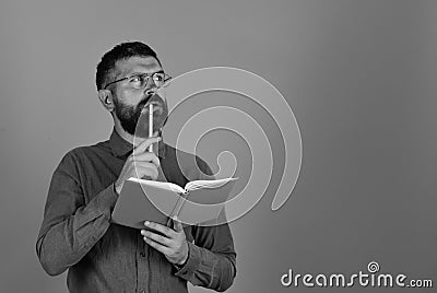 Man with beard and book. Idea and knowledge concept Stock Photo