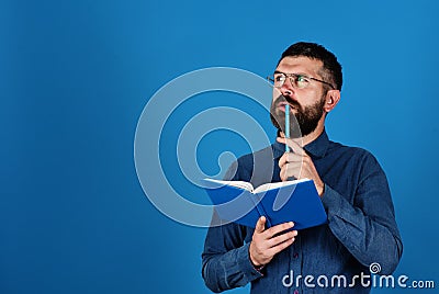 Man with beard and book. Idea and knowledge concept Stock Photo