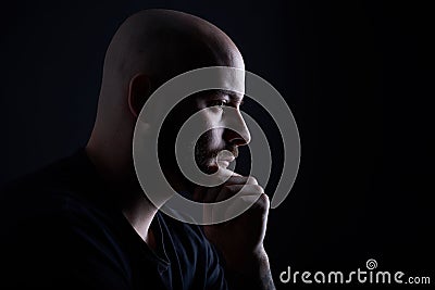 The man with beard on dark gray background Stock Photo