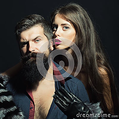 Man with beard and girl in gloves Stock Photo