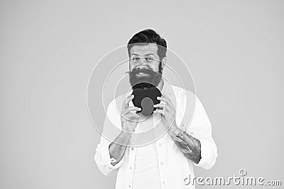 Man bearded hipster hold red heart. Health care concept. Check helps understand risk factors for heart disease. Doing Stock Photo