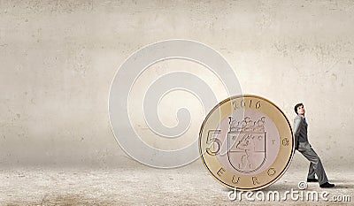Man and big coin Stock Photo
