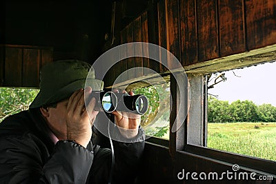 Man birdwatching Stock Photo