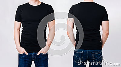 Man in black blank tshirt on gray background Stock Photo