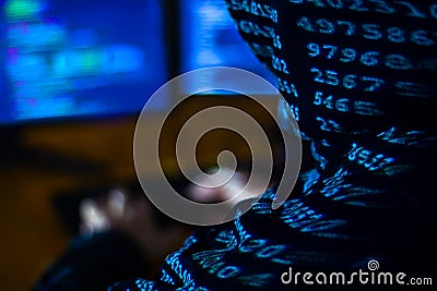 Hacker hacking computer password at night Stock Photo