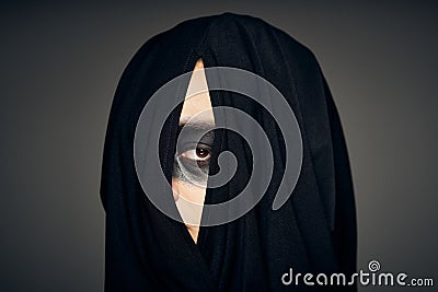 man in black mask halloween horror ghost dark background Stock Photo