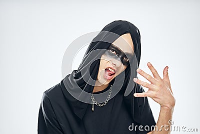 man in black mask halloween horror ghost dark background Stock Photo