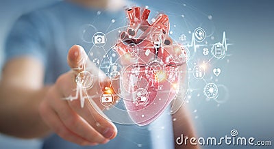 Man using digital x-ray of human heart holographic scan projection 3D rendering Stock Photo