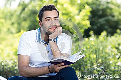 Man with book Stock Photo