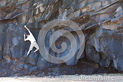 Man bouldering Stock Photo