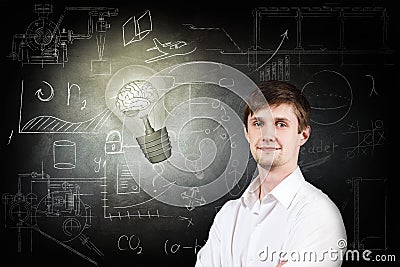 Man and bright bulb over icons background. Stock Photo