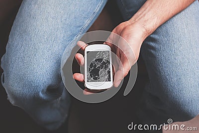 Man with broken smart phone Stock Photo