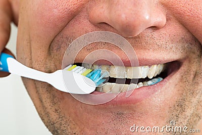 Man brushing teeth Stock Photo